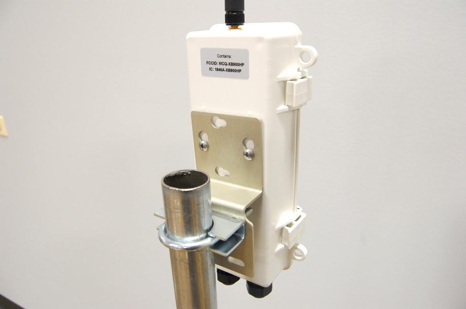 5. Mount using provided hardware and tighten screws using a Phillips screwdriver (see fig. 10). Although the antenna should be vertical, the housing can be oriented horizontally or vertically.