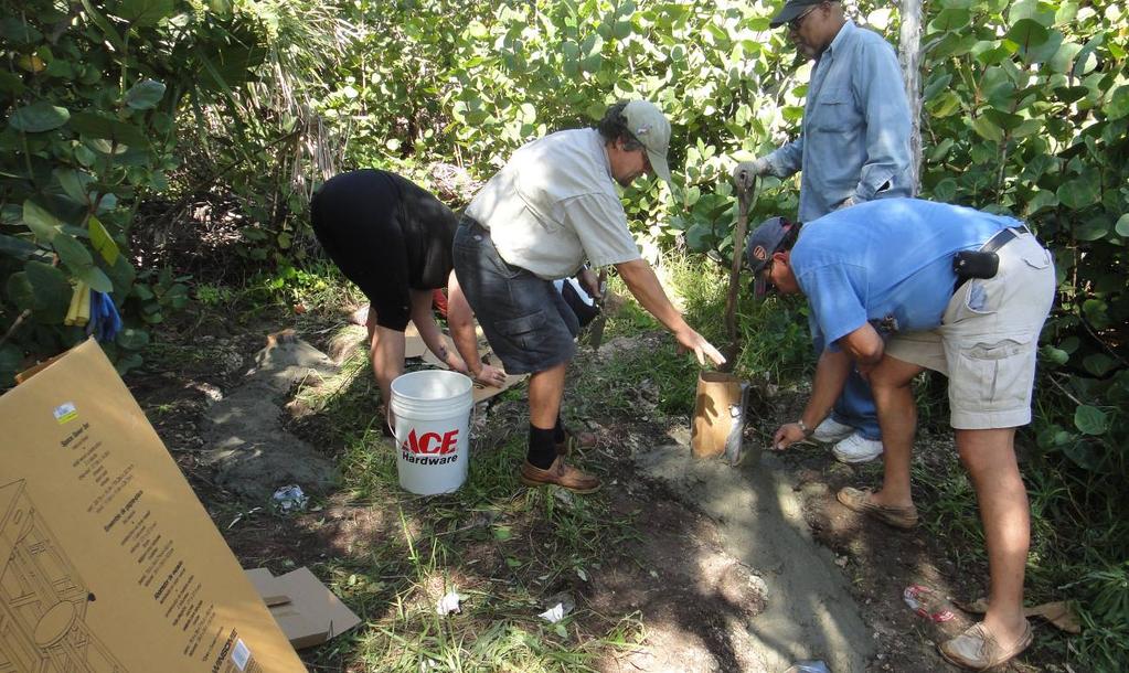 Fig.10: Ascendant volunteers working with Conservation Officer to build new concrete Cahow nest burrows at B translocation site.