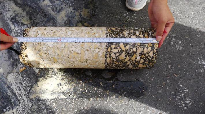 Figure 2. Cored sample at K575+783.5. 2) Sections with cement stabilized crushed stone base layer sealed with crushed stone These four sections include K548+000~K548+380(0.38km), K549+860~K550+000(0.