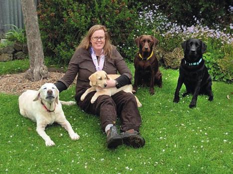 Jne Brtlett pictured with Bernie (13 yers old), Coco (2 yers old), Buster (1 yer old) nd Bernice (3 months).