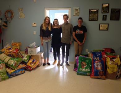 Technology staff member Matt Froncek was in on the organization of the fundraiser with the final total that included $882.00 and 1,256 pounds of dog and cat food collected by the students.