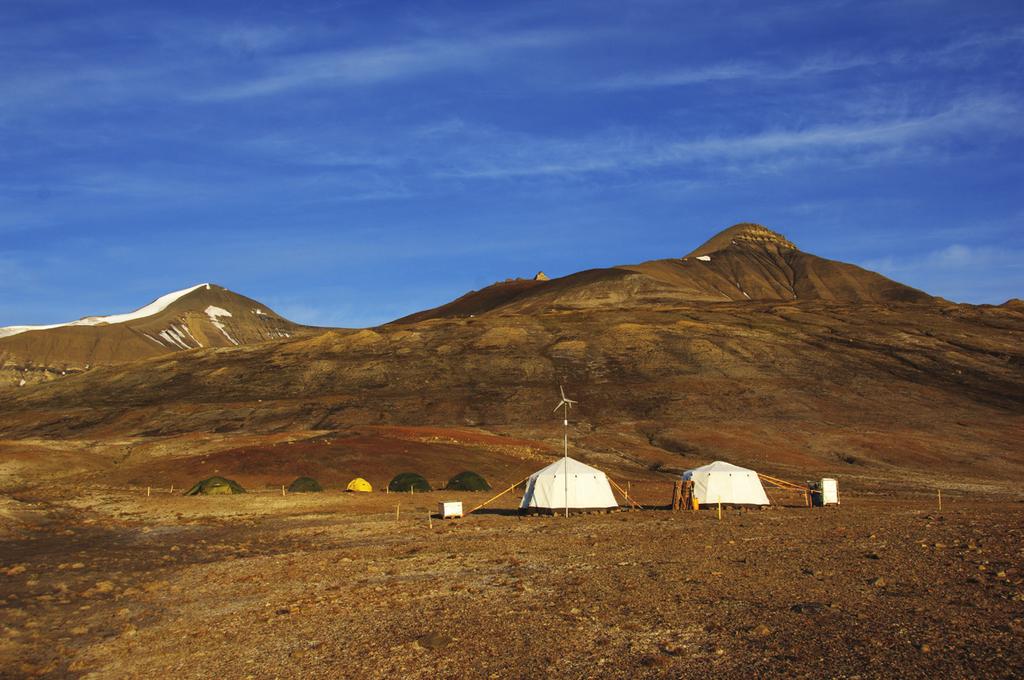 Fig. 1. The excavation camp in 2009, at the base of Janusfjellet Mountain. (Photo: Jørn H. Hurum.) Fig. 2. Spitsbergen Mesozoic Research Group on the 2010 excavation, consisting of researchers, students and volunteers.