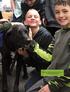 Students in Three Lakes interact with one of the district s therapy dogs. 4 Wisconsin School News