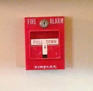 The fire alarm says PULL DOWN but we do not