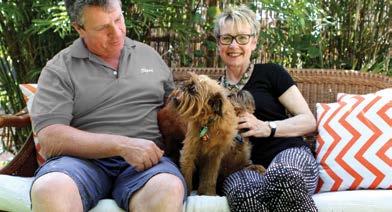 Janet is pictured with her partner Graham and their two Griffon Bruxellois, Angus and Hamish.