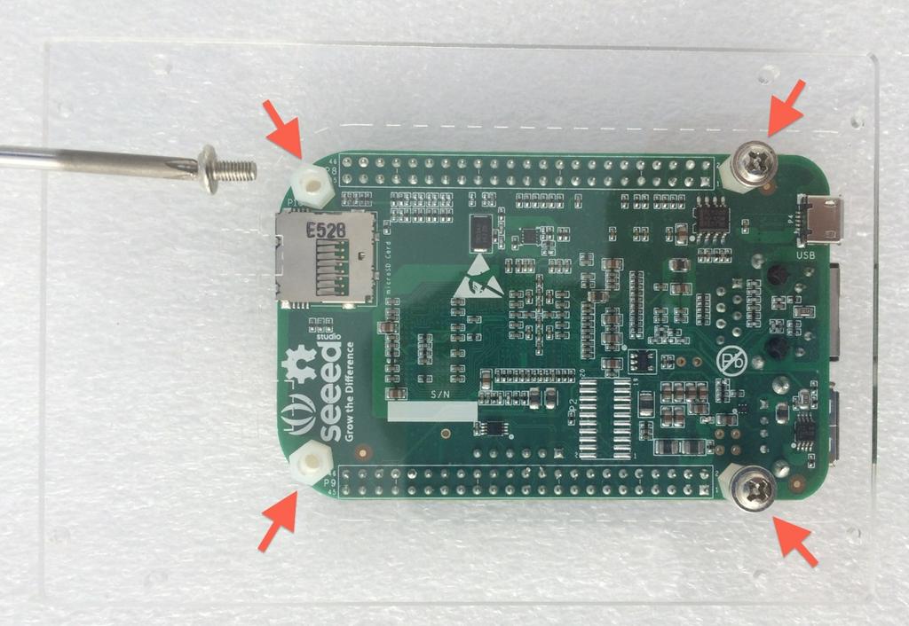 Attach BeagleBone to the bottom plastic plate with four metal screws using a Phillips screwdriver.