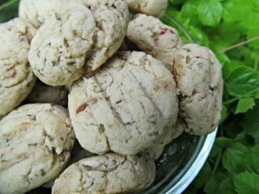 Minty Biscuits Ingredients: 1 cup freshly chopped mint leaves 2 large eggs ⅓ cup canola oil 3 teaspoons honey 4-5 drops peppermint oil 1 ½ cups flour ⅓ cup cornmeal ½ teaspoons baking