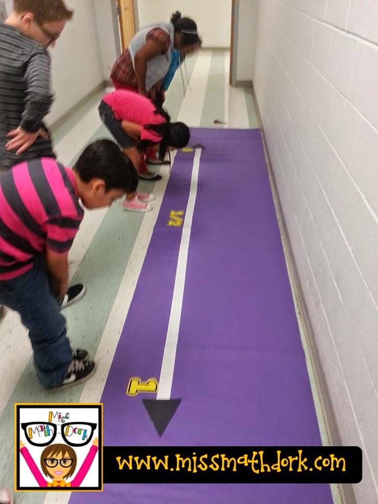 Then, as a class, we decided what color out number line should be - they chose purple.