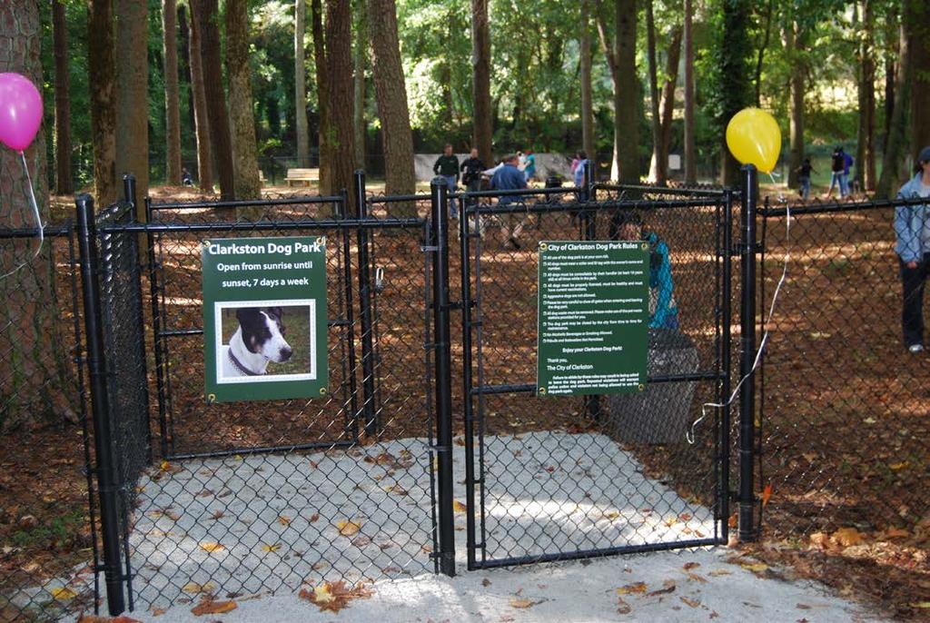 What a Dog Park Needs Entry Gates & Signage Clear signage posted on gate, stating rules and