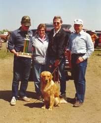 When Ches and WHEATFIELDS MASTER MIND WC came out of the Obedience ring after qualifying in Novice A, Rusty was immediately handed off to his breeder Judi Edgar, to be shown to a placement in the