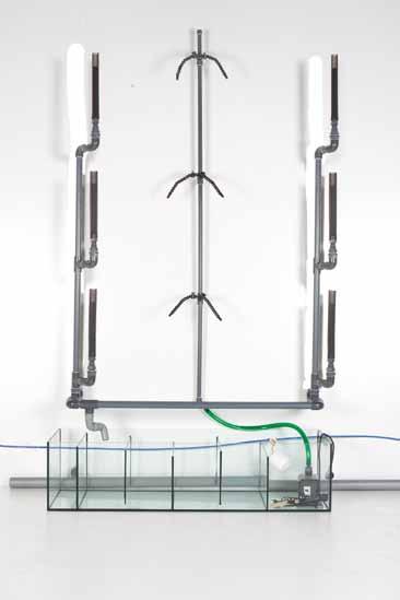 The overflow pipes can easily be screwed off to allow the aquariums to be emptied rapidly for cleaning, and the flexible tap over each compartment directs the