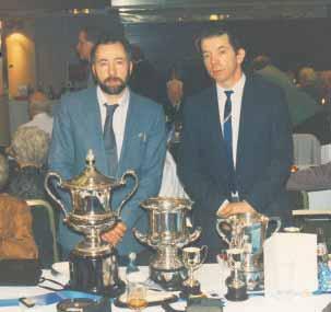 WE FLY AT DAWN The McCaw s by Sid Collins Leonard & Willie McCaw with INFC trophies won in 1993.