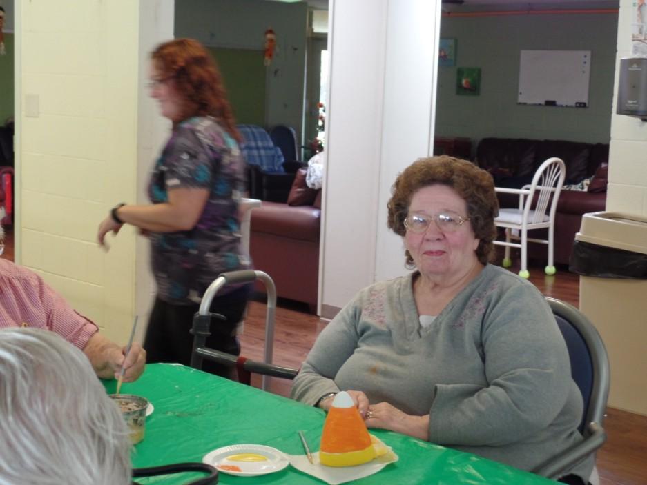 Above in pictures 1-3 are our residents painting ceramic candy
