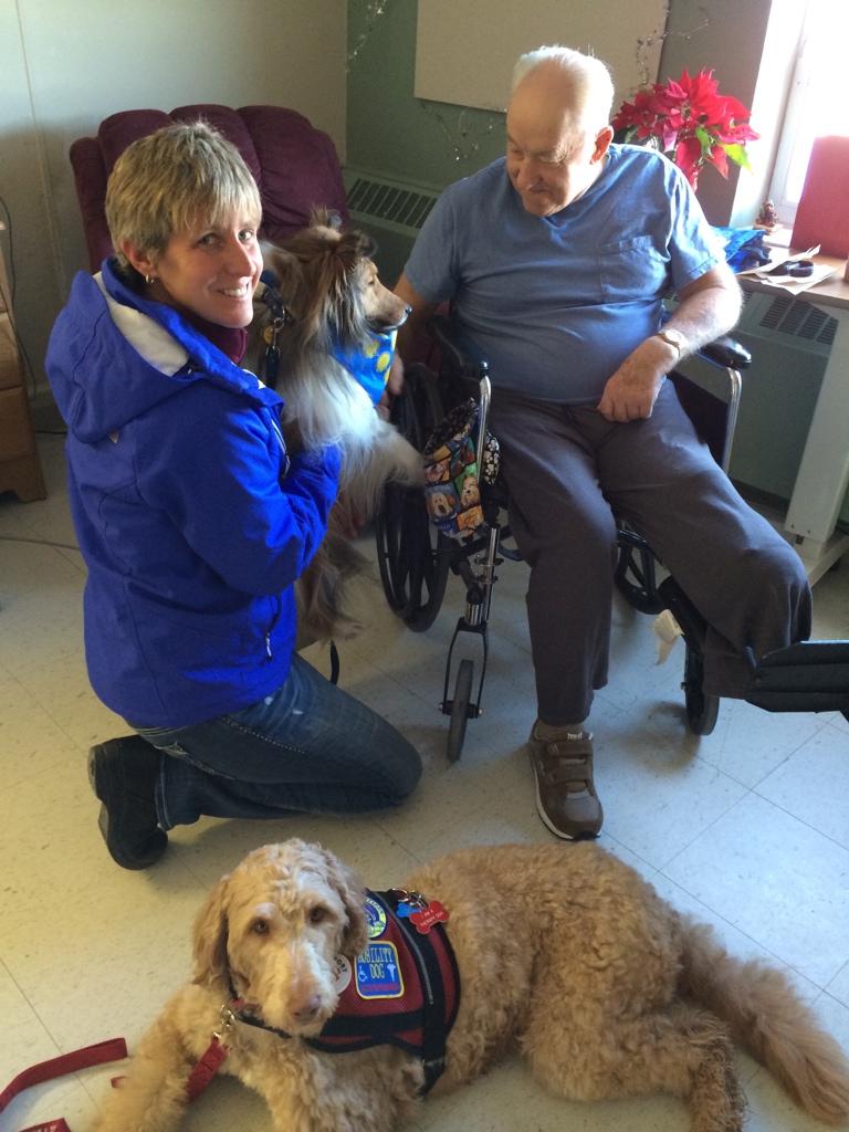 Here is Molly with her Certified Therapy Dog, "STRYKER," enjoying a