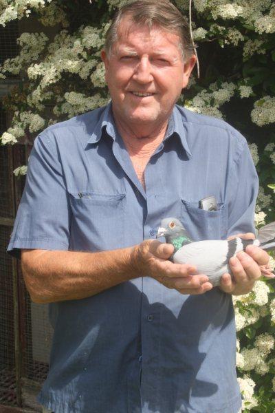 Brian holds his bird which was hawked last year. This year he recovered well and has shown good form.