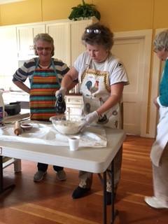 12 students learned to mix and roll dough,
