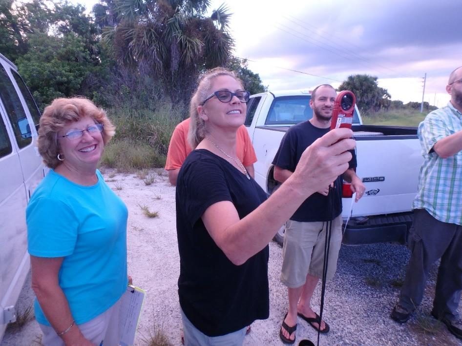specialists conducting research on pythons and other invasive reptiles in the Florida Everglades.